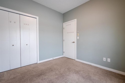 117-402 Marquis Lane Se, Calgary, AB - Indoor Photo Showing Other Room