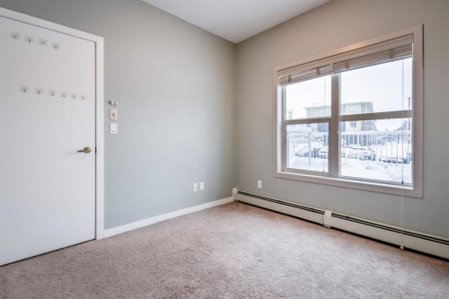 117-402 Marquis Lane Se, Calgary, AB - Indoor Photo Showing Other Room