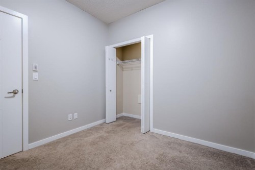 117-402 Marquis Lane Se, Calgary, AB - Indoor Photo Showing Other Room