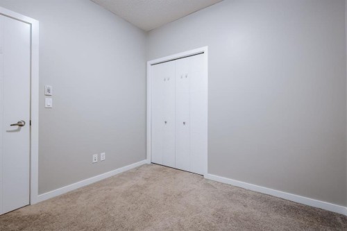 117-402 Marquis Lane Se, Calgary, AB - Indoor Photo Showing Other Room