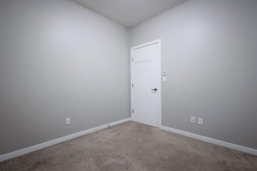 117-402 Marquis Lane Se, Calgary, AB - Indoor Photo Showing Other Room