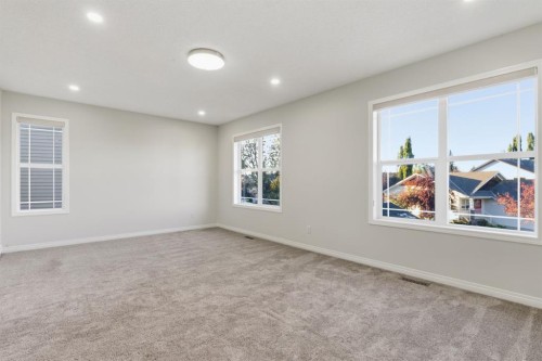 64 Cougarstone Square Sw, Calgary, AB - Indoor Photo Showing Other Room