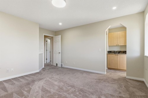 64 Cougarstone Square Sw, Calgary, AB - Indoor Photo Showing Other Room