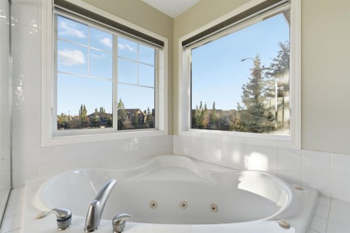 64 Cougarstone Square Sw, Calgary, AB - Indoor Photo Showing Bathroom