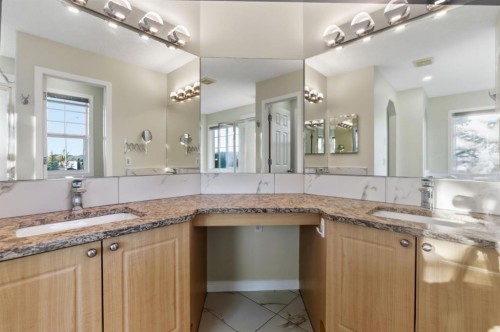 64 Cougarstone Square Sw, Calgary, AB - Indoor Photo Showing Bathroom