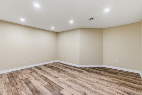 64 Cougarstone Square Sw, Calgary, AB - Indoor Photo Showing Other Room