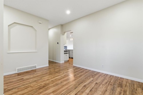 64 Cougarstone Square Sw, Calgary, AB - Indoor Photo Showing Other Room