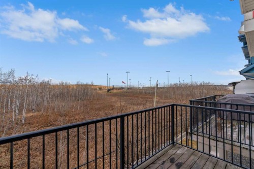 34 New Brighton Point Se, Calgary, AB - Outdoor With Balcony