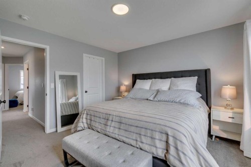 63 Wolf Gate, Okotoks, AB - Indoor Photo Showing Bedroom