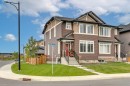 63 Wolf Gate, Okotoks, AB  - Outdoor With Facade 
