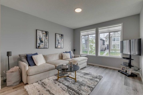 63 Wolf Gate, Okotoks, AB - Indoor Photo Showing Living Room