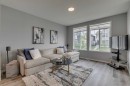 63 Wolf Gate, Okotoks, AB  - Indoor Photo Showing Living Room 