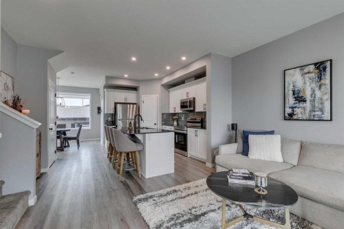 63 Wolf Gate, Okotoks, AB - Indoor Photo Showing Living Room