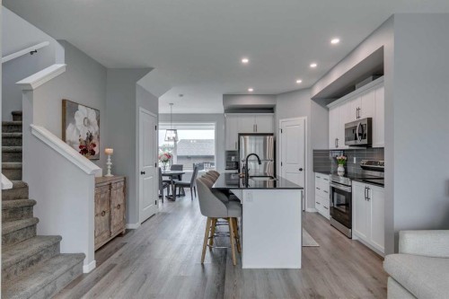 63 Wolf Gate, Okotoks, AB - Indoor Photo Showing Kitchen With Upgraded Kitchen