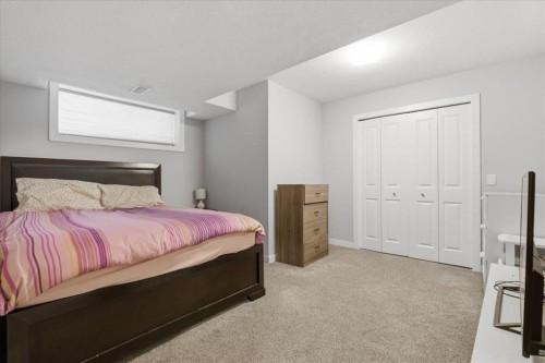 52 Brightoncrest Terrace Se, Calgary, AB - Indoor Photo Showing Bedroom