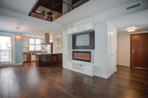 N/A-201 1 Street Se, Calgary, AB - Indoor Photo Showing Living Room With Fireplace