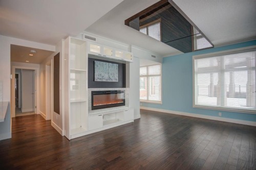 N/A-201 1 Street Se, Calgary, AB - Indoor Photo Showing Other Room With Fireplace