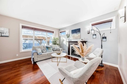 297 Evanspark Gardens Nw, Calgary, AB - Indoor Photo Showing Living Room With Fireplace