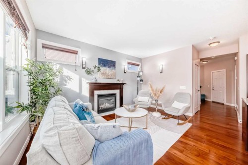297 Evanspark Gardens Nw, Calgary, AB - Indoor Photo Showing Living Room With Fireplace