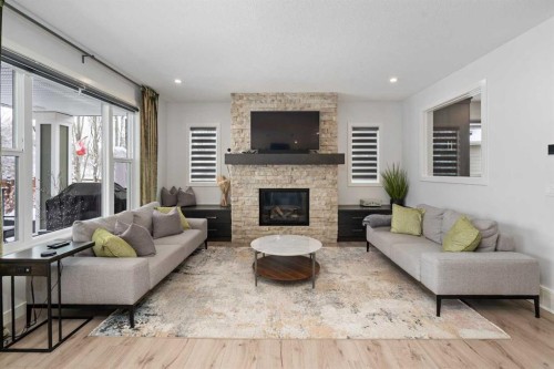 81 Cranbrook Place Se, Calgary, AB - Indoor Photo Showing Living Room With Fireplace