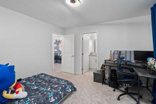 81 Cranbrook Place Se, Calgary, AB - Indoor Photo Showing Bedroom