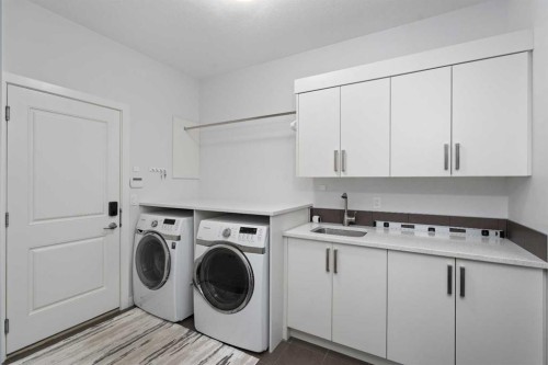 81 Cranbrook Place Se, Calgary, AB - Indoor Photo Showing Laundry Room