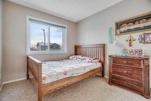 104 Cove Crescent, Chestermere, AB - Indoor Photo Showing Bedroom
