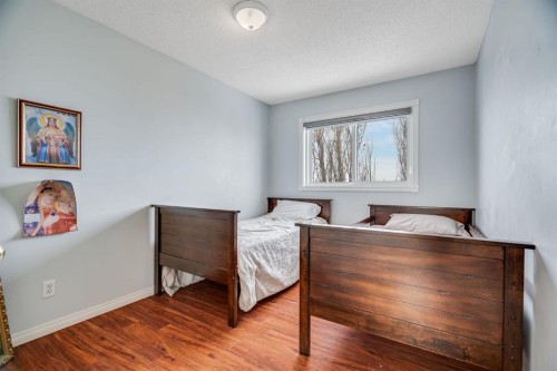 104 Cove Crescent, Chestermere, AB - Indoor Photo Showing Bedroom