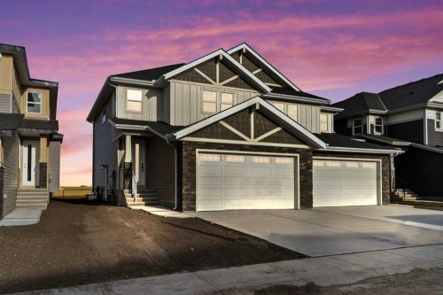 486 Kinniburgh Loop, Chestermere, AB - Outdoor With Facade