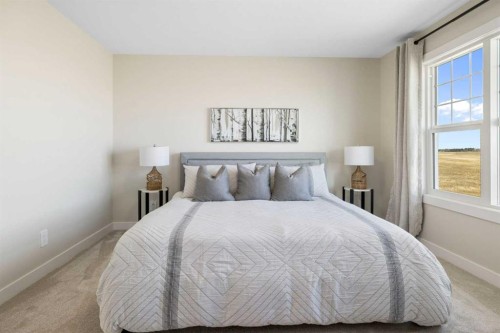 486 Kinniburgh Loop, Chestermere, AB - Indoor Photo Showing Bedroom