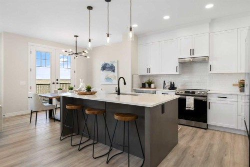 486 Kinniburgh Loop, Chestermere, AB - Indoor Photo Showing Kitchen With Upgraded Kitchen