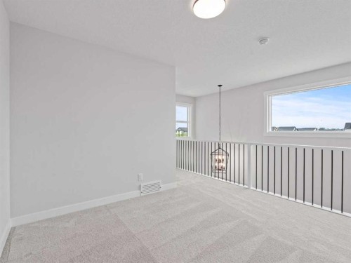 307 Kinniburgh Loop, Chestermere, AB - Indoor Photo Showing Other Room