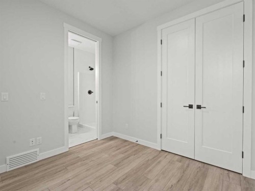 307 Kinniburgh Loop, Chestermere, AB - Indoor Photo Showing Other Room