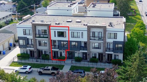 109-15 Rosscarrock Gate Sw, Calgary, AB - Outdoor With Balcony With Facade
