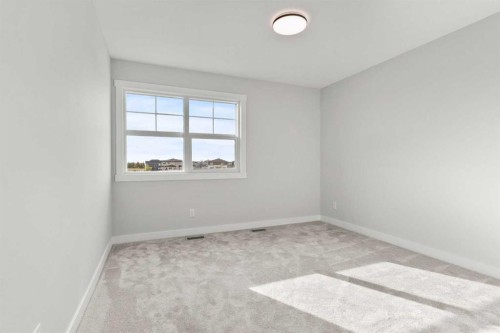 315 Kinniburgh Loop, Chestermere, AB - Indoor Photo Showing Other Room