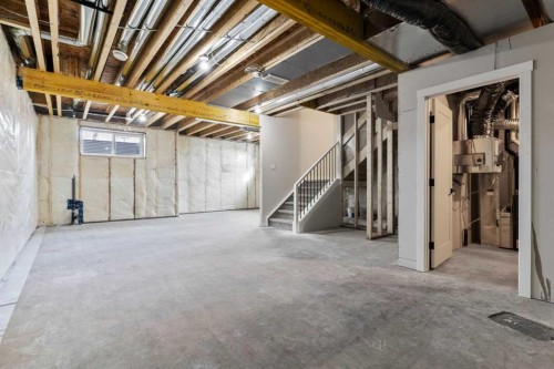 315 Kinniburgh Loop, Chestermere, AB - Indoor Photo Showing Basement