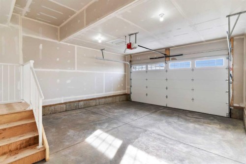 315 Kinniburgh Loop, Chestermere, AB - Indoor Photo Showing Garage