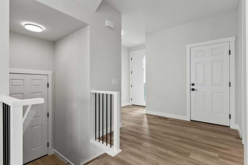 315 Kinniburgh Loop, Chestermere, AB - Indoor Photo Showing Other Room