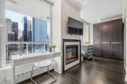 1526-222 Riverfront Avenue Sw, Calgary, AB - Indoor With Fireplace