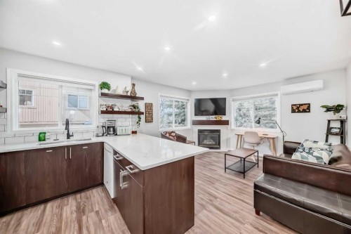 108-1000 Harvie Heights Road, Harvie Heights, AB - Indoor With Fireplace