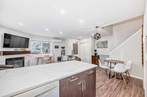 108-1000 Harvie Heights Road, Harvie Heights, AB - Indoor With Fireplace