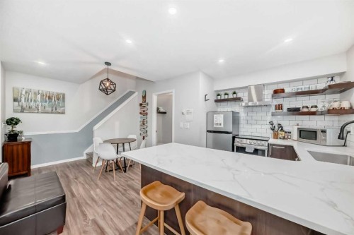 108-1000 Harvie Heights Road, Harvie Heights, AB - Indoor Photo Showing Kitchen