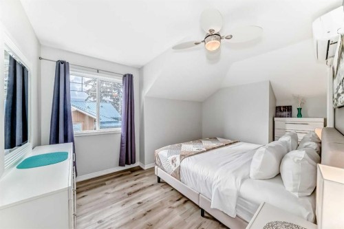 108-1000 Harvie Heights Road, Harvie Heights, AB - Indoor Photo Showing Bedroom