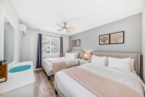 108-1000 Harvie Heights Road, Harvie Heights, AB - Indoor Photo Showing Bedroom