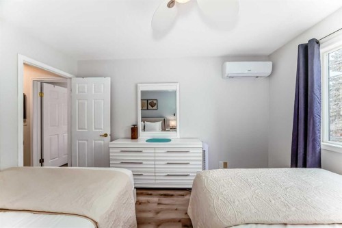 108-1000 Harvie Heights Road, Harvie Heights, AB - Indoor Photo Showing Bedroom