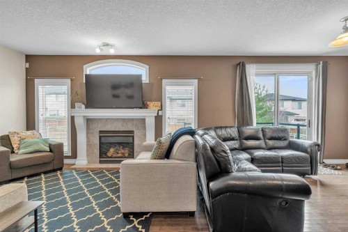 29 Kincora Hill Nw, Calgary, AB - Indoor Photo Showing Living Room With Fireplace