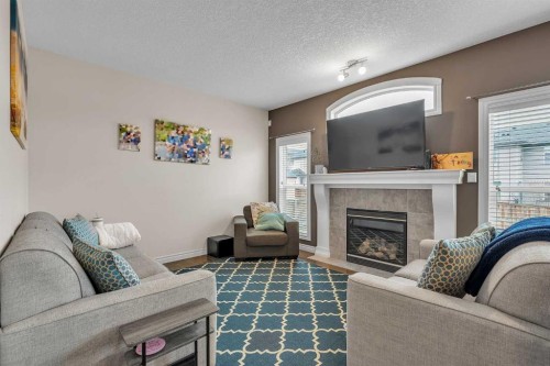 29 Kincora Hill Nw, Calgary, AB - Indoor Photo Showing Living Room With Fireplace