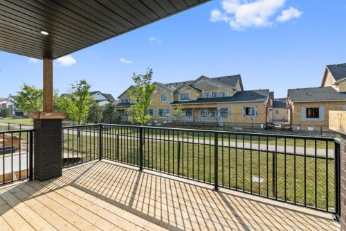 601-15 Coopersfield Link Sw, Airdrie, AB - Outdoor With Deck Patio Veranda With Exterior