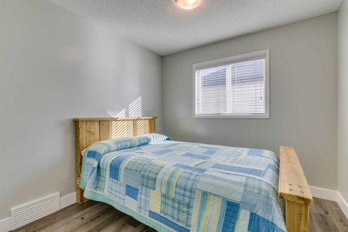 199 Everglen Way Sw, Calgary, AB - Indoor Photo Showing Bedroom