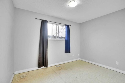 52 Pennsburg Way Se, Calgary, AB - Indoor Photo Showing Other Room